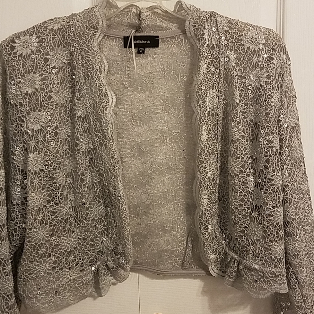 Beautiful, feminine dressy, sparkly silver shrug.